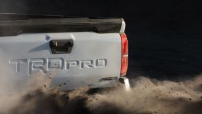 2024 Toyota Tacoma Hybrid teaser showing only a bit of the tailgate