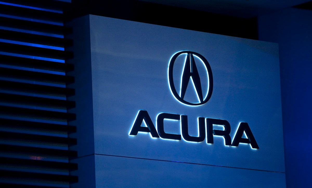 The Acura logo at the NAIAS. The 2010 Acura MDX is one of the best used SUVs to buy under $10,000