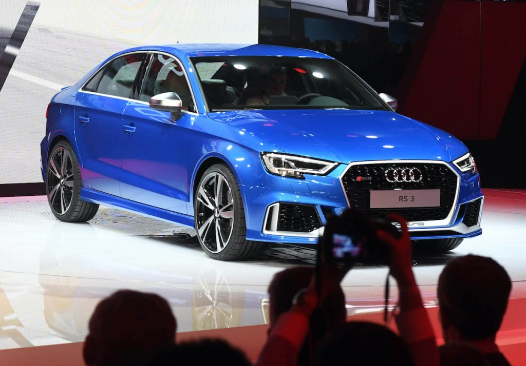 A 2018 Audi RS3 at an auto show.