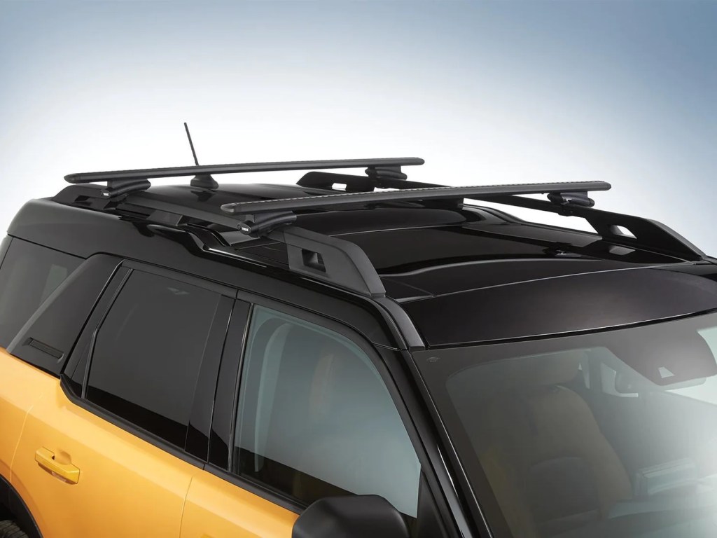 Crossbar accessories installed on the roof of a new Ford Bronco Sport.