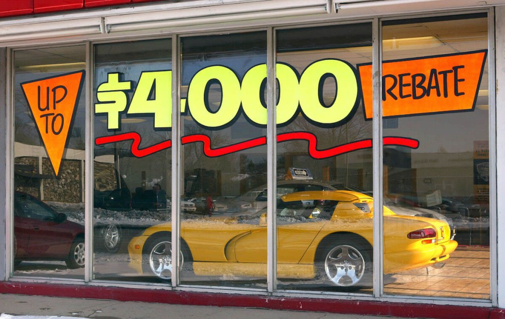 A Dodge Viper sits in a dealer showroom.