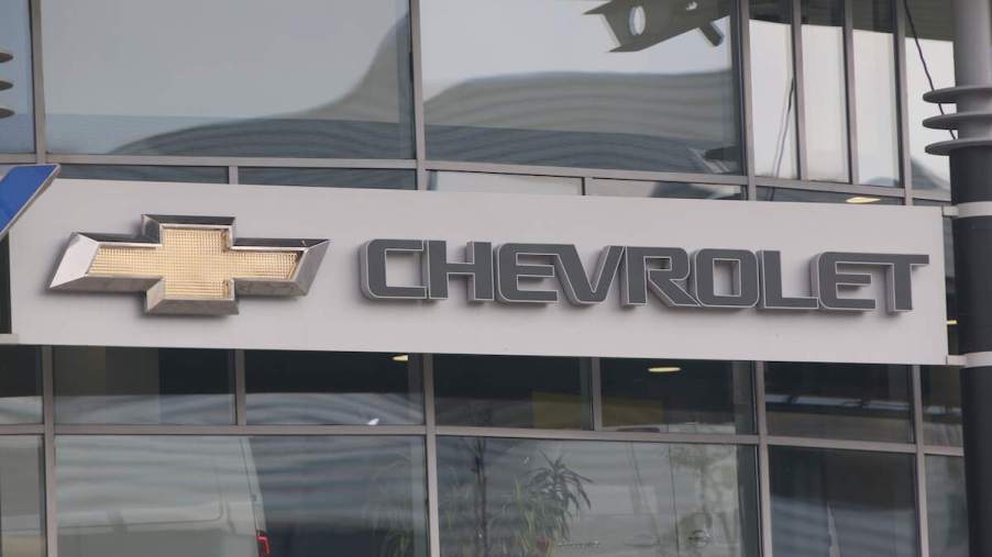 A Chevrolet logo on the side of a building.