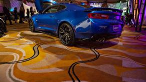 A blue Chevy Camaro model with a Lingenfelter Supercharger upgrade at the 2019 NAIAS event in Detroit, Michigan