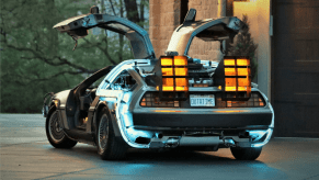 DeLorean DMC-12 Time Machine parking in front of a house