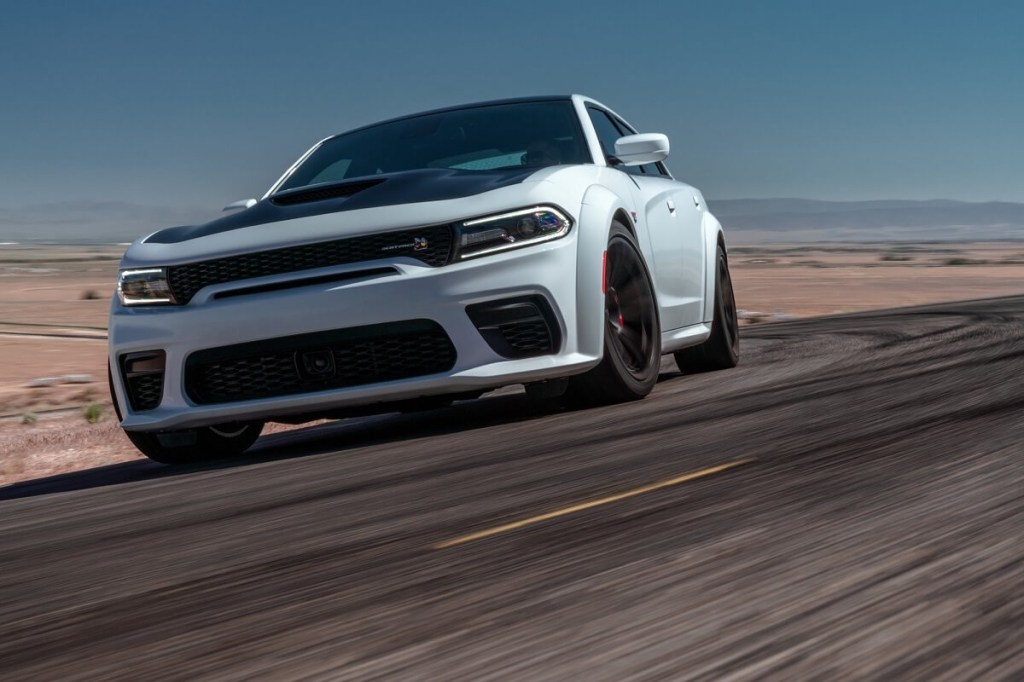 A Dodge Charger R/T Scat Pack Widebody gets sideways on a track. 
