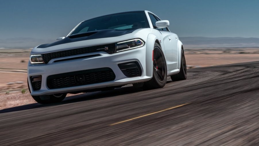 A Dodge Charger R/T Scat Pack Widebody gets sideways on a track.