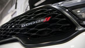 A Dodge emblem on the front of a Durango.