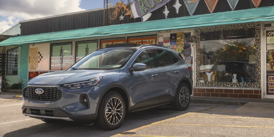 A blue 2023 Ford Escape Plug-In Hybrid is parked. 