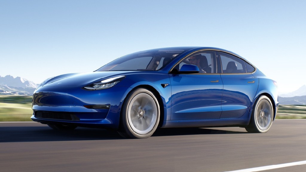 Front angle view of blue Tesla Model 3, highlighting lawsuit claiming Model 3 Autopilot defect caused deaths