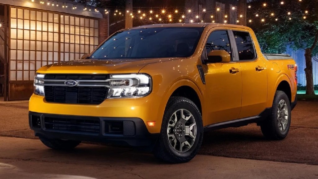 Front angle view of orange 2023 Ford Maverick compact pickup truck