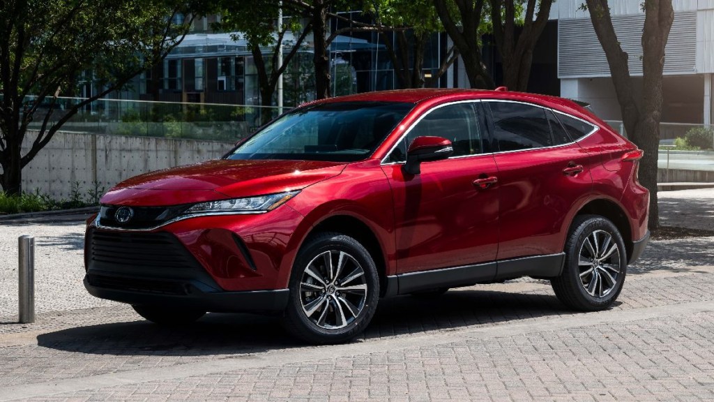 Front angle view of red 2023 Toyota Venza midsize crossover SUV