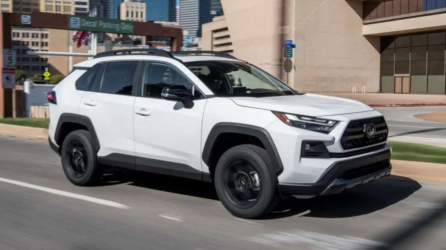 Front angle view of 2021 Toyota RAV4 SUV, highlighting lawsuit for roof rail leak that causes water damage