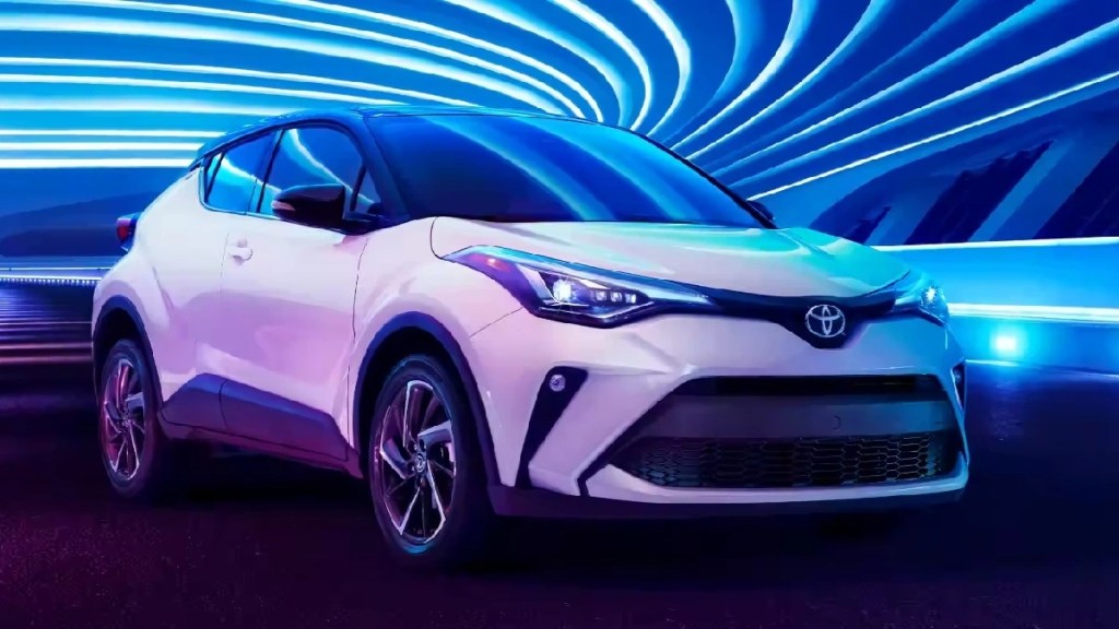 Front angle view of white 2022 Toyota C-HR subcompact crossover SUV