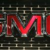 The GMC emblem on a vehicle grille as seen on the GMC Typhoon performance SUV model