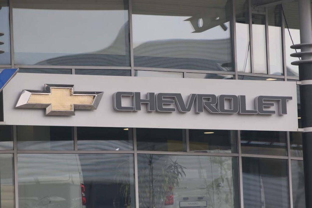 A Chevrolet logo on the side of a building. 