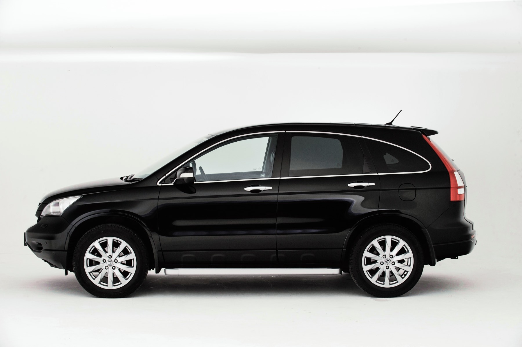 Side view of a second-generation Honda CR-V on a white backdrop.