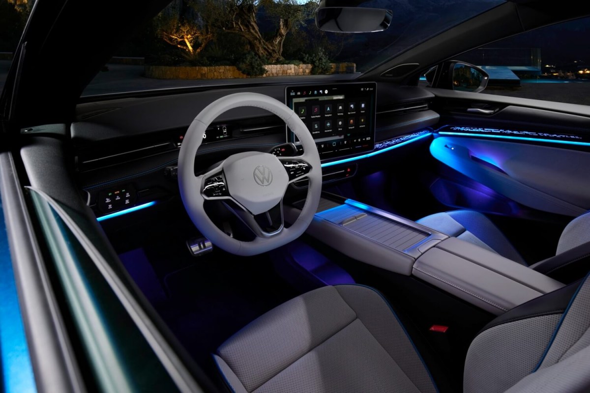 Nighttime interior of the VW ID.7 with ambient lighting and large center display