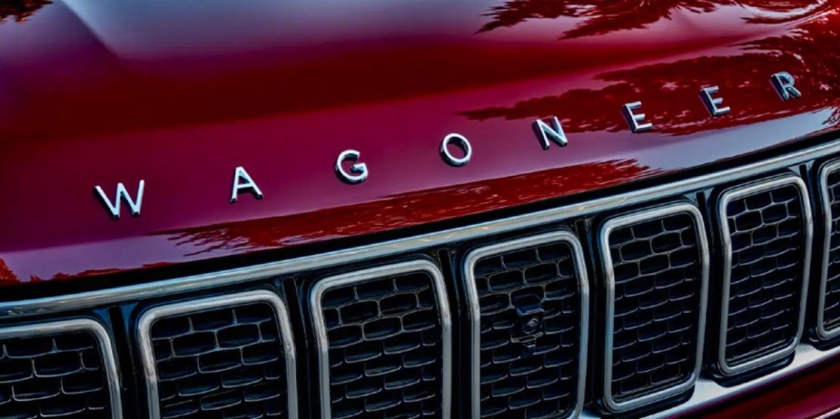 The front of a red 2023 Jeep Wagoneer full-size SUV. 