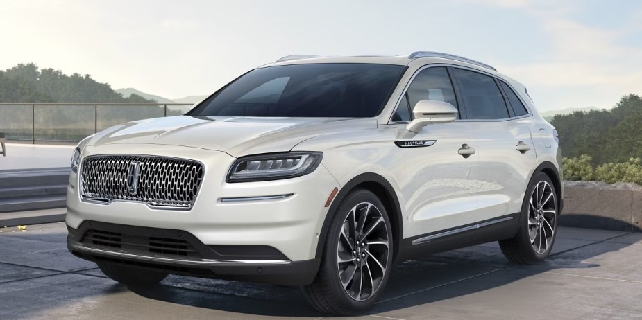 A white 2023 Lincoln Nautilus midsize luxury SUV is parked. 