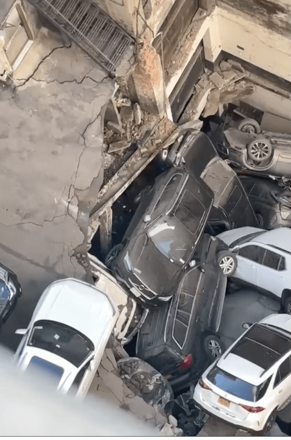 closeup of cars piled after the collapse