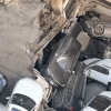 closeup of cars piled after the collapse