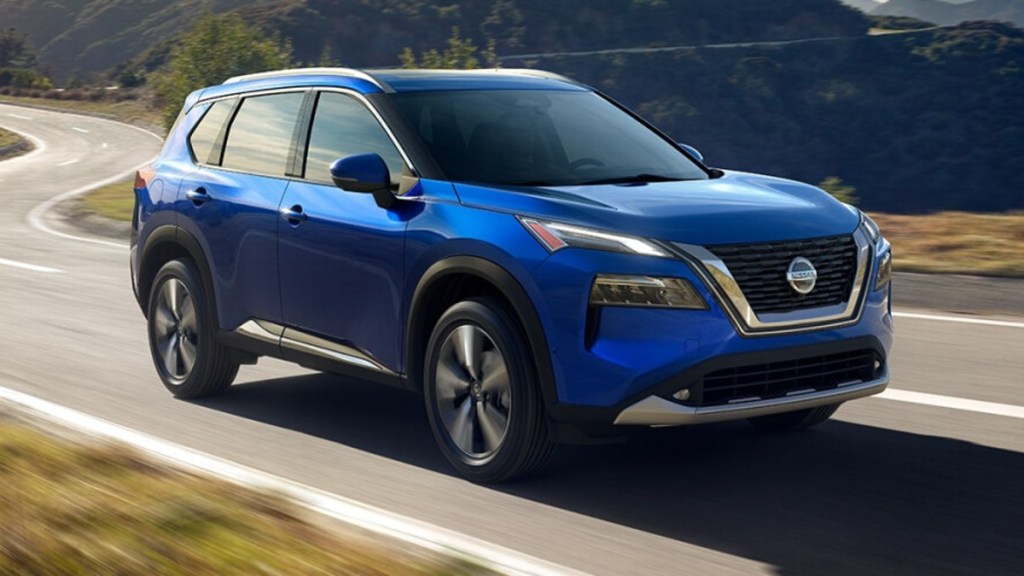 Blue 2021 Nissan Rogue Driving on a Highway - Nissan Rogue Reliability