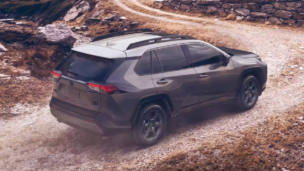 Rear angle view of 2021 Toyota RAV4 SUV, highlighting lawsuit for roof rail leak that damages electronics and airbags