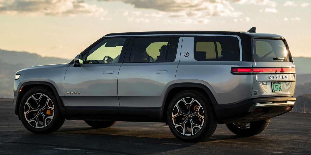 A gray 2023 Rivian R1S full-size electric SUV is parked.