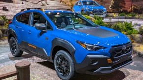 A blue 2024 Subaru Crosstrek Wilderness is parked at the New York International Auto Show.
