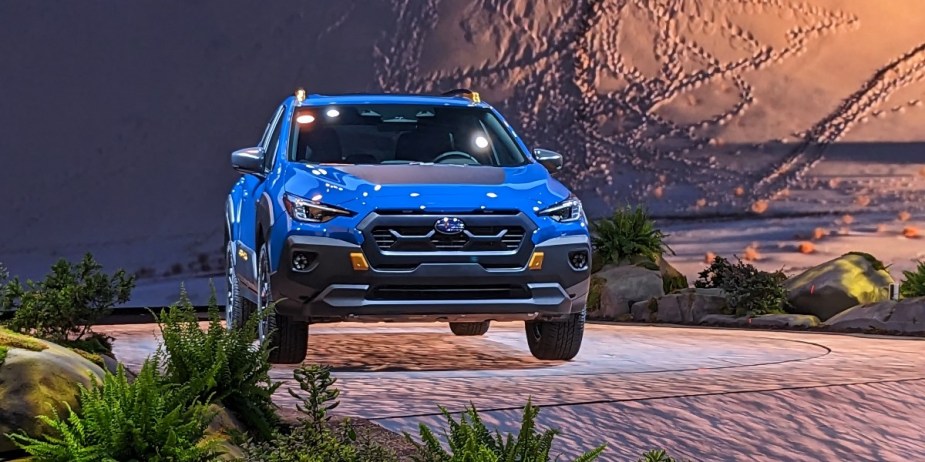A blue 2024 Subaru Crosstrek Wilderness is parked at the 2023 NY International Auto Show. 