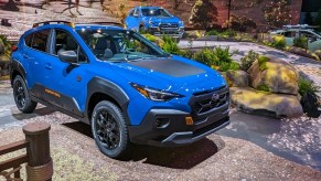 Blue 2024 Subaru Crosstrek Wilderness models at the 2023 NY Auto Show.