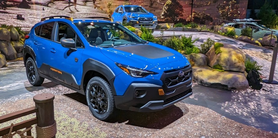 A blue 2024 Subaru Crosstrek Wilderness is parked at the 2023 New York International Auto Show. 