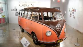 A vintage VW Bus on display at an event.