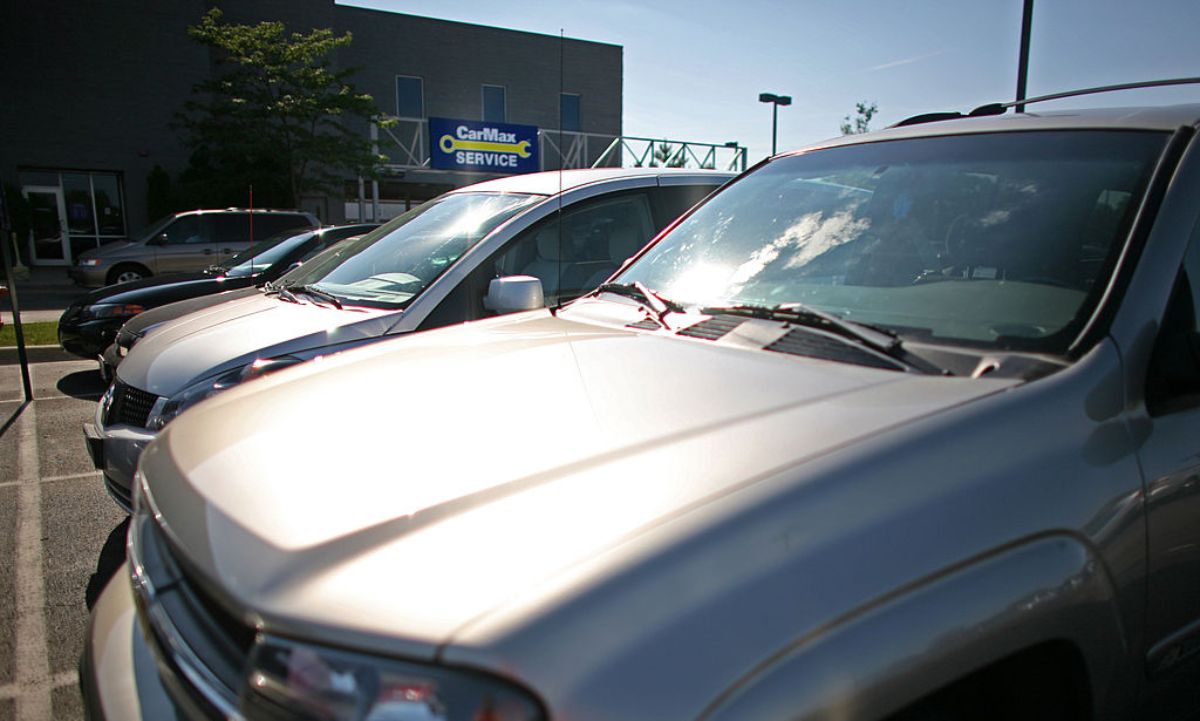 A used cars and SUVs for sale at a dealership.