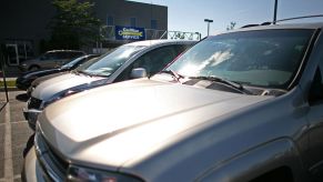 A used cars and SUVs for sale at a dealership.