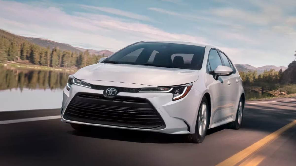 White 2023 Toyota Corolla Hybrid sedan, most reliable car and 1 of cheapest new hybrids