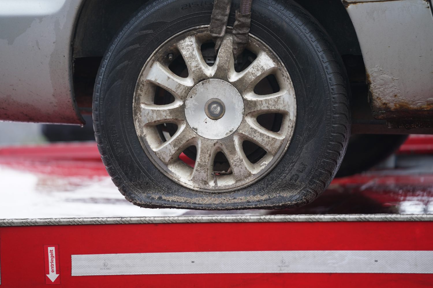 A flat tire on a car