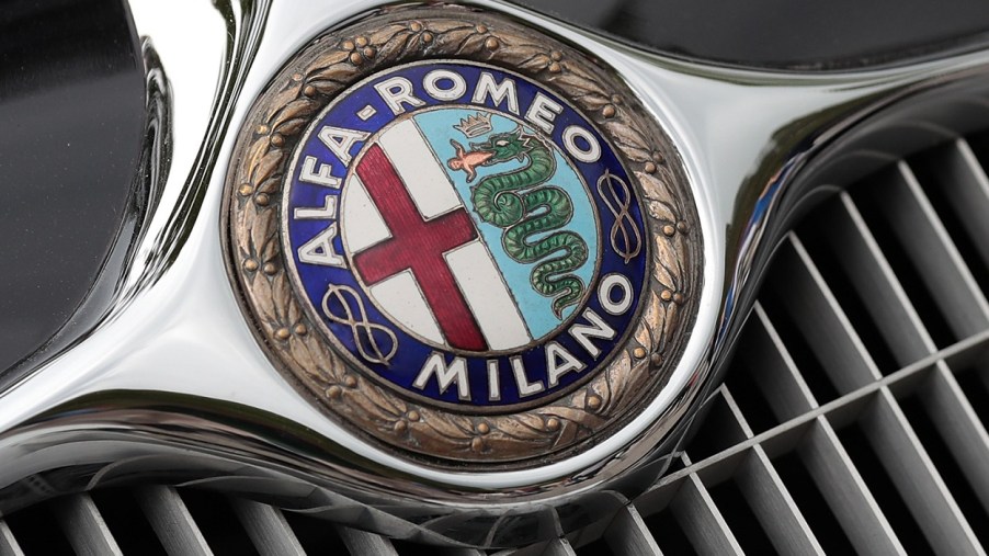 An Alfa Romeo badge on an Alfa Romeo 8C car