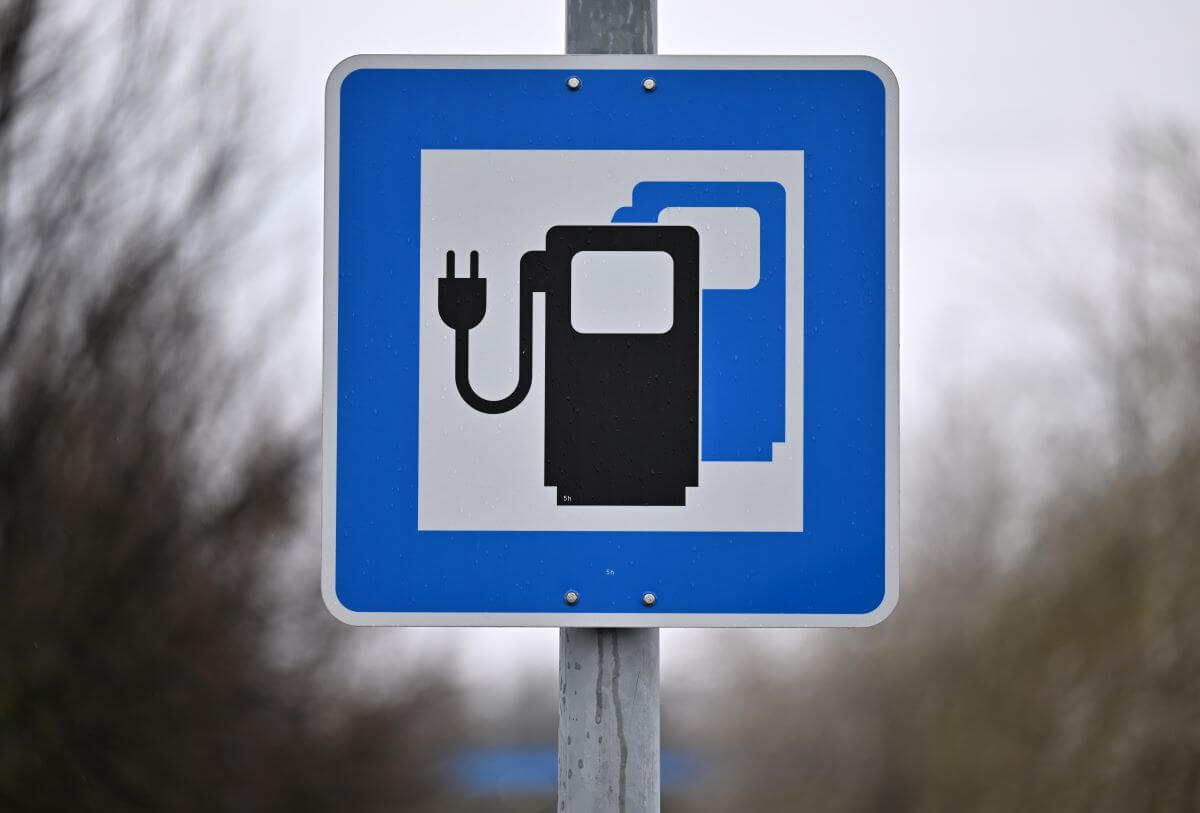 A traffic sign indicating an electric vehicle (EV) charging station seen in Thuringia, Mellingen, Germany