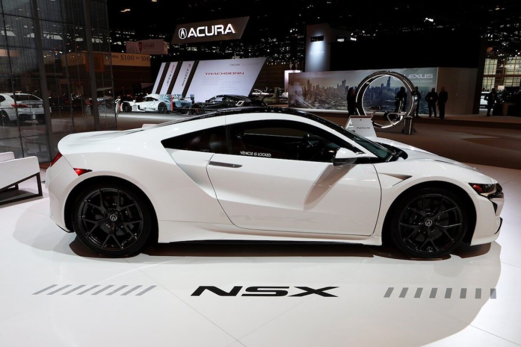 A side profile view of the second-generation Honda NSX at an auto show