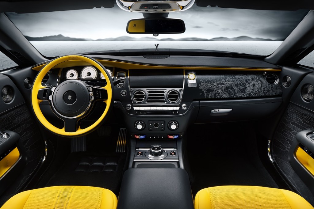 The interior of the Rolls Royce Wraith in black and yellow