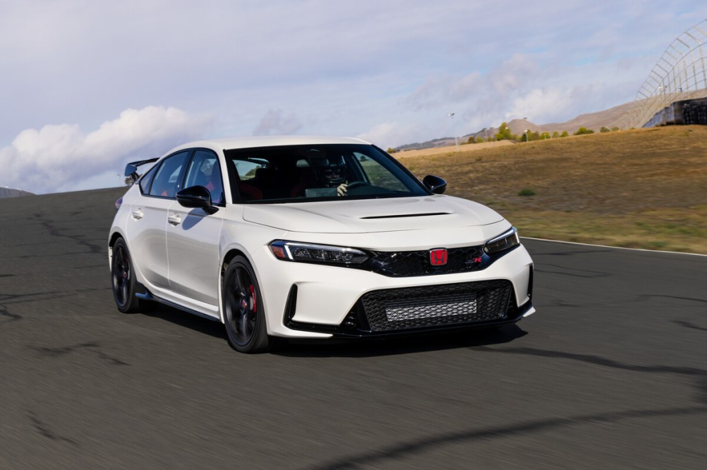 The car brand's fastest hatchback, the 2023 Honda Civic Type R takes a corner. 