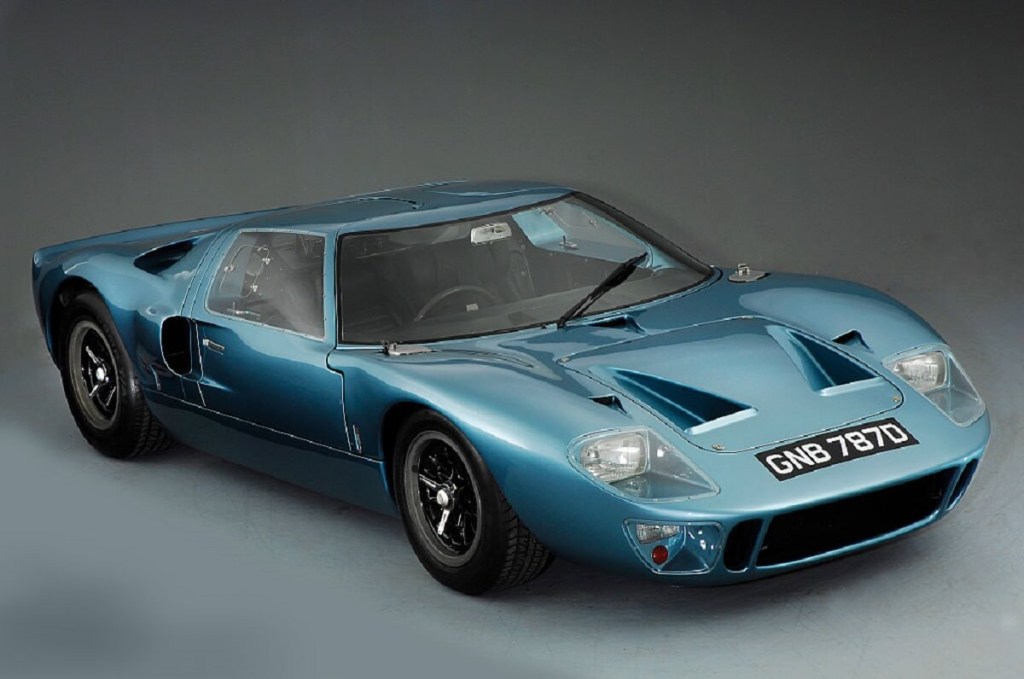 A popular supercar kit, the Ford GT40, poses on a stage.