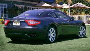 A used 2008 Maserati GranTurismo shows off its luxury GT car proportions at a car show.
