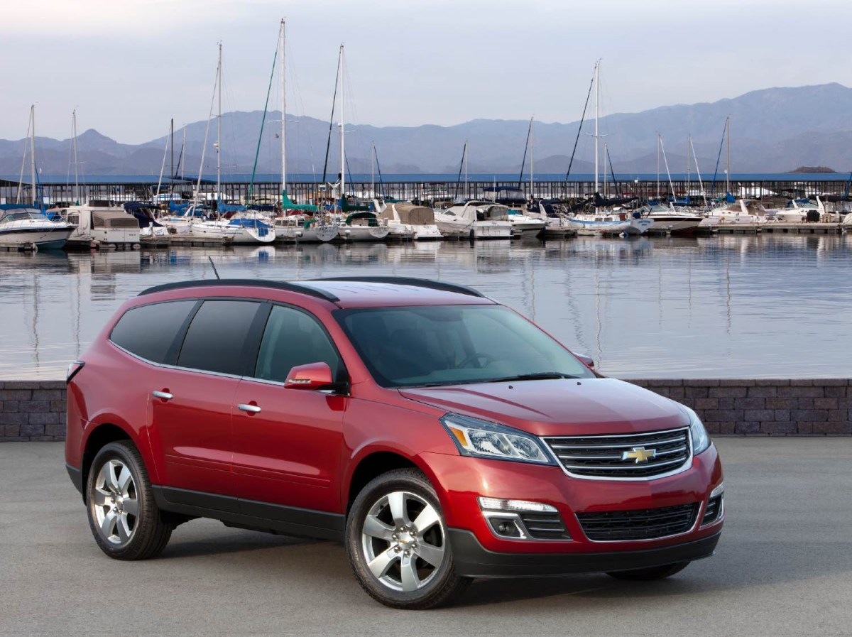 2013 Chevrolet Traverse SUV in red from the side. This is another SUV with transmission problems