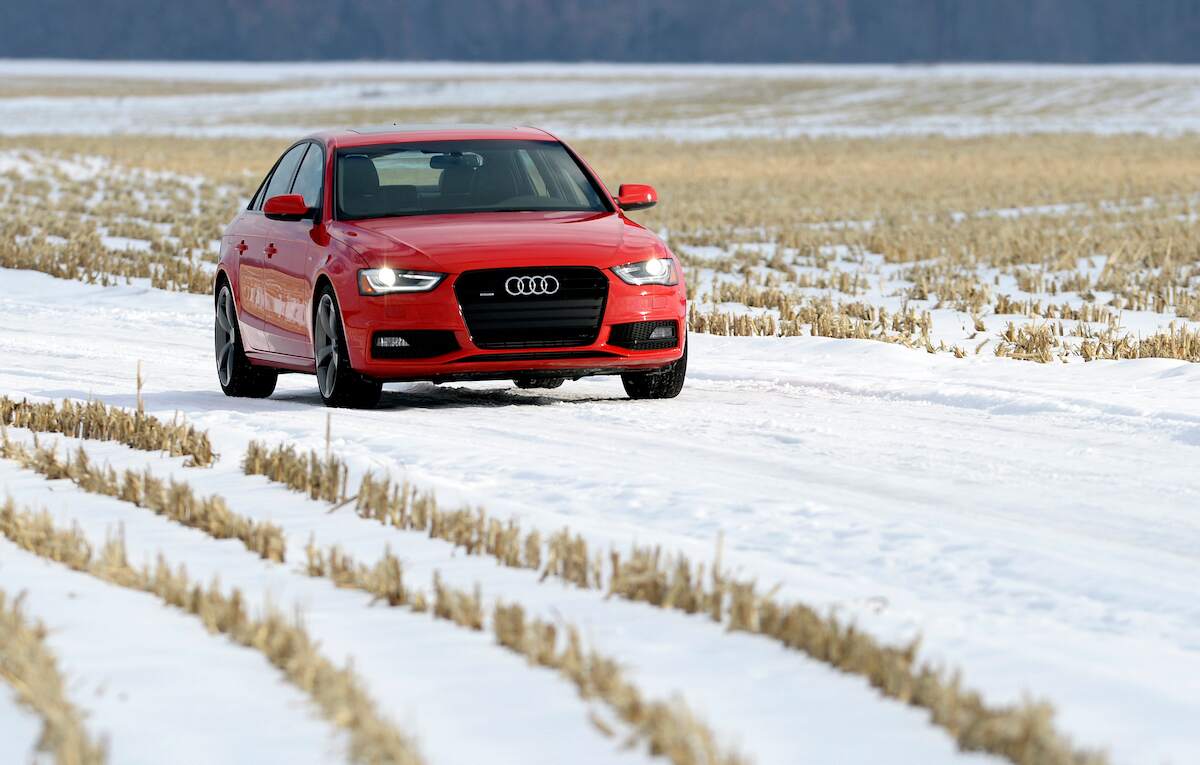 A red 2015 Audi A4 drives in the Northampton Meadows in Massachusetts on Jan. 16, 2015