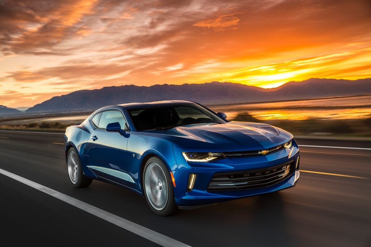 A used blue 2017 Chevy Camaro shows off its sixth-gen styling like the 2018 model.