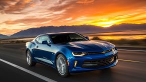 A used blue 2017 Chevy Camaro shows off its sixth-gen styling like the 2018 model.