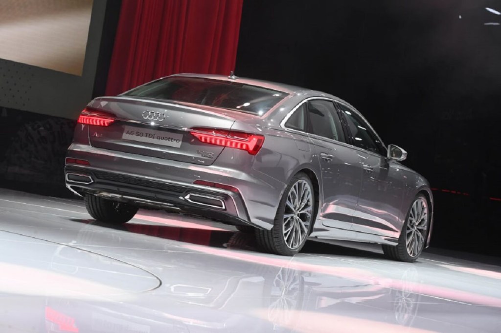 A used 2018 Audi A6, a nice car between the A4 and A8, sits on a stage. 