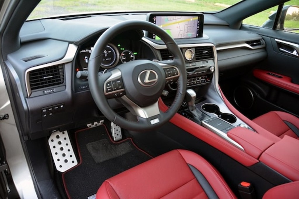 2020 Lexus RX 450h F Sport Interior featuring red leather 
 seats and metal sport pedals